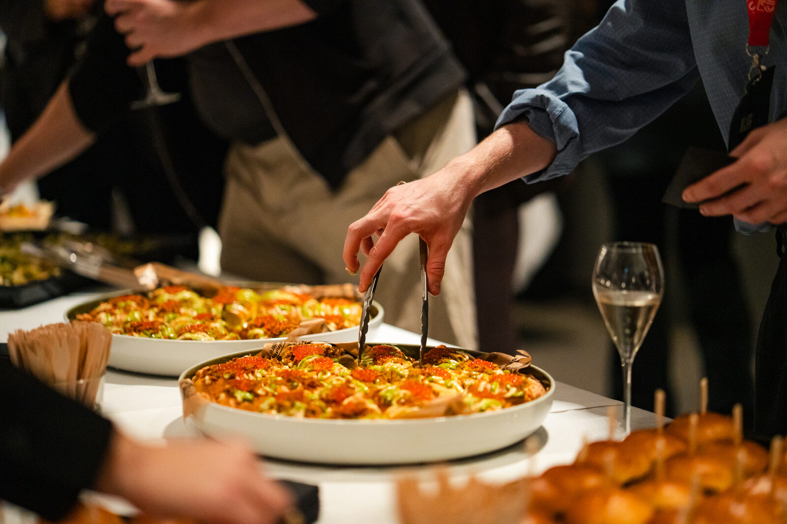 Dinner being served from a large pan